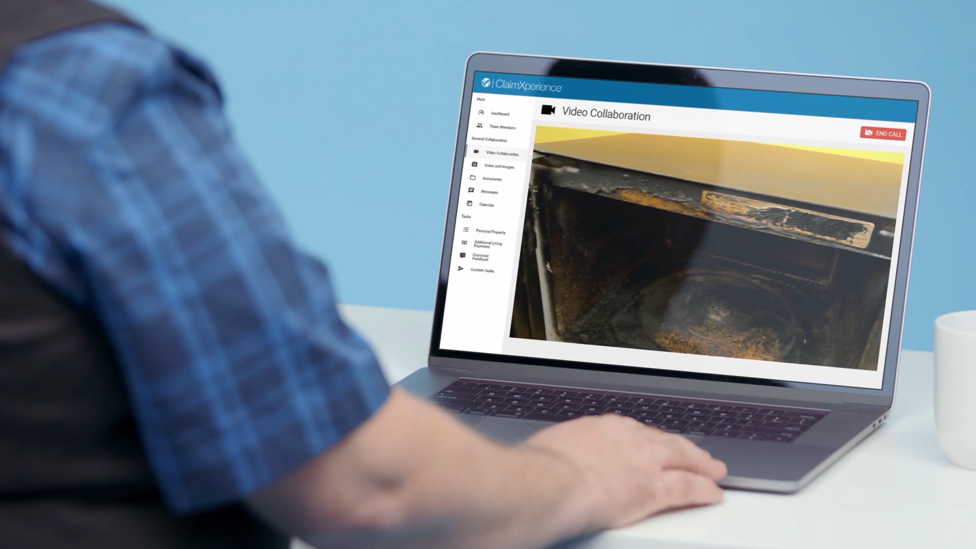 ClaimXperience web portal during a live video session on a laptop